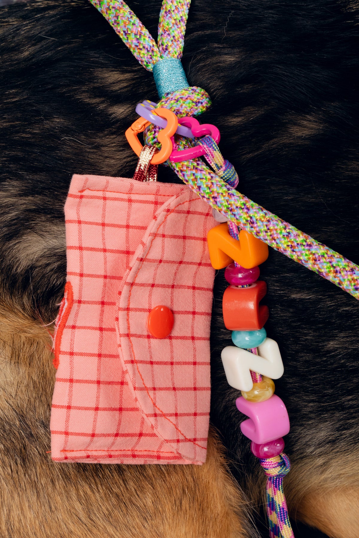 Poop bag Lulu rose à carreaux